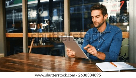 Cafe, man and reading on tablet for remote work, article information or online blog for publication. Coffee shop, male person and content writer with digital for freelancer, newsletter and editing
