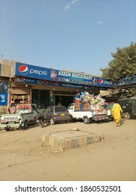 A Cafe Named Azeem Restaurant With Cars Parked Outside. The Signboard Is Sponsored By Pepsi   - Karachi Pakistan - Nov 2020