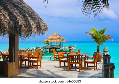 Cafe On The Beach, Ocean And Sky