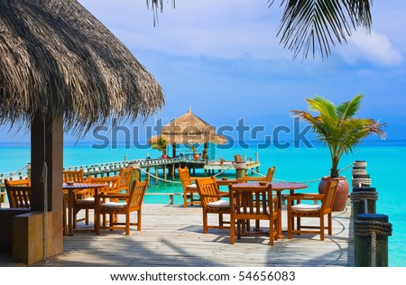 Cafe on the beach, ocean and sky