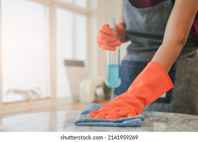 Cafe Owner Cleaning Table Before Open In Covid 19 Situation