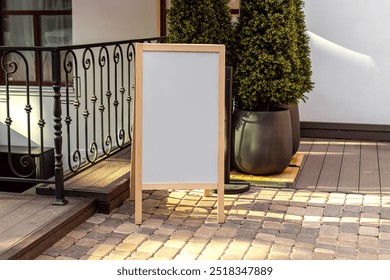 Cafe or shop sidewalk wooden sign board. Mock up