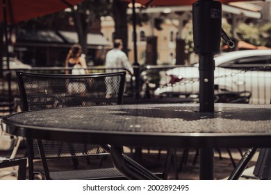 Cafe Table On Urban City Downtown Sidewalk Outside Restaurant In The Summer