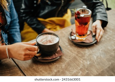 cafe and tea choice enjoying in outdoor cafe - Powered by Shutterstock