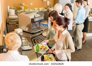 Cafeteria woman pay at cashier hold serving tray fresh food