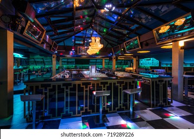 Caffee Bar Interior With Skylight By Night