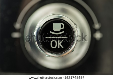 Caffee machine button. Macro symbol