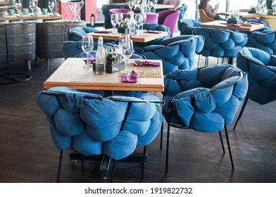 Caffee restaurant interior empty table blue chairs