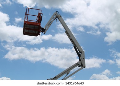 The Cage And Long Arm Of A Cherry Picker Lift.