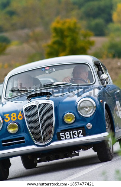 CAGLI , ITALY - OTT 24 - 2020\
: LANCIA AURELIA B20 GT 2500 1957  on an old racing car in rally\
Mille Miglia 2020 the famous italian historical race\
(1927-1957