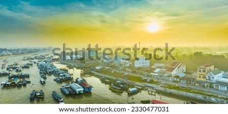 Cai Rang floating market, Can Tho, Vietnam, aerial view, sunrise background. Cai Rang is famous market in mekong delta, Vietnam.