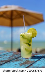 Caipirinha Drink Served On The Table On The Beach. Typical Brazilian Drink.