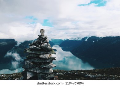 Cairn And Fjord In Norway 