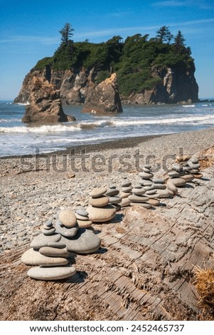 Cairn of rocks stacked on Ruby Beach on the Olympic Peninsula in the Olympic National Park in Washington State, USA