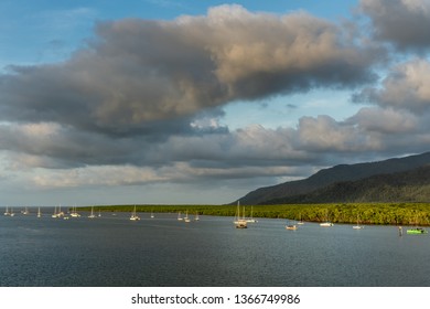 Cairns, Australia - February 18, 2019: Evening Shot At Sunset. Anchored White Small Sailing Boats On 