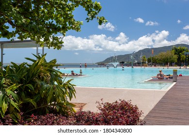 Cairns, Australia - October 15, 2009: People Resting In Public Swimming Pool Near The Tropical Beach