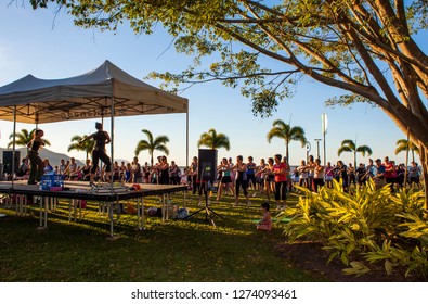 CAIRNS, QUEENSLAND, AUSTRALIA - 19 AUGUST 2011: Free Outdoor Aerobics Class On The Cairns Foreshore At Sunset Attracts Locals And Tourists Alike.