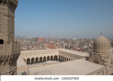 Cairo cityscape including Al Mo'ayyad Mosque in Cairo, Egypt, located next to Bab Zuweila.