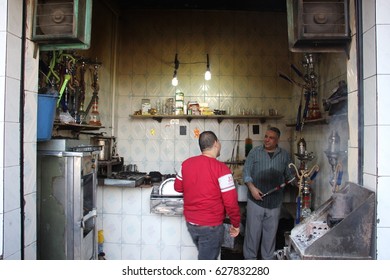 CAIRO, EGYPT - CIRCA APRIL 2017: In this little stall in Islamic Cairo, local men regularly come to smoke shisha (nargile) and just hang out.