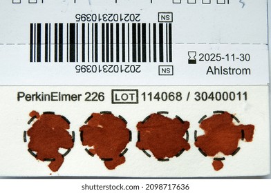 Cairo, Egypt, December 25 2021: PerkinElmer 226 Spot Saver RUO Card With An Infant Blood Sample Collection On It Include The High Quality Ahlstrom 226 Grade Paper Used To Test Thyroid Gland Functions