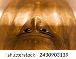 Cairo, Egypt - February 17,2024: Golden coffin of Nedjemankh at the National Museum of Egyptian Civilization in Cairo.