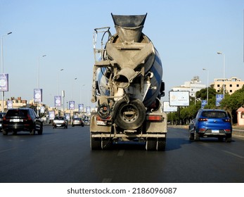 Cairo, Egypt, July 24 2022: A Concrete And Cement Transit Mixer Lorry Truck On Its Way To Deliver Concrete To A Construction Site, It Combines Cement, Aggregate Such As Sand Or Gravel, And Water