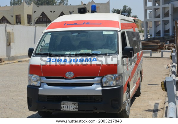 Cairo, Egypt, July 7 2021: An equipped ambulance car\
ready to deal with  emergency cases amid coronavirus covid-19\
pandemic with its medical team that is ready to deal with any\
emergency case on call