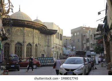 Cairo, Egypt, June 2021. Egyptian morning activities around historic buildings that provide a place for buying and selling. with old buildings designed by old architecture. during the ancient Islamic.