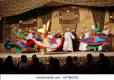 Cairo, EGYPT - May 12, 2012: Male Egyptian Sufi Dancers In Colorful Circular Sheet