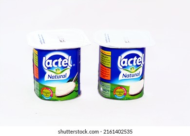 Cairo, Egypt, May 27 2022: Lactel natural yoghurt, Natural source of calcium, vitamins and minerals and contains no preservatives, selective focus of natural yogurt in a plastic container isolated