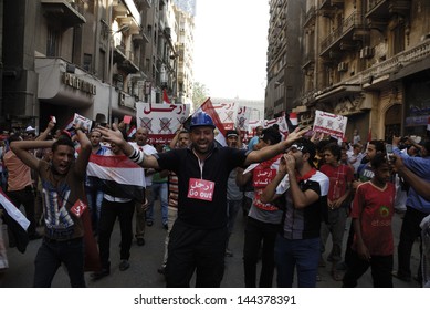 CAIRO - JUNE 30: Anti Muslim Brotherhood/Morsi Protesters In Tahrir Street Shout Slogans Calling For Morsi's Resignation On June 30, 2013 In Cairo, Egypt.