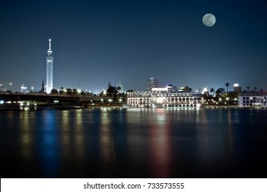 Cairo Skyline At Night With Full Moon In The Scene 