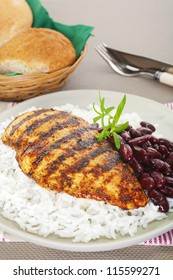 Cajun Chicken, Cooked On The Griddle, With Rice And Red Kidney Beans.