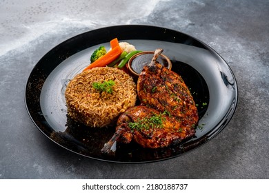 Cajun Chicken With Fried Rice Served In A Dish Isolated On Dark Background Side View Food