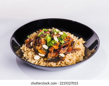 Cajun Chicken With Rice, Full Of Flavor And Hot Spices With Fresh Vegetable Bio Peas