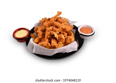 Cajun Chicken And Sauces In The Bucket. Fast Food Fries With Cajun Chicken. White Background And Shadow