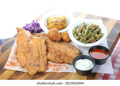 Cajun Fried Catfish. Catfish Filets With Grilled Corn  Green Beans. Southern Cooking