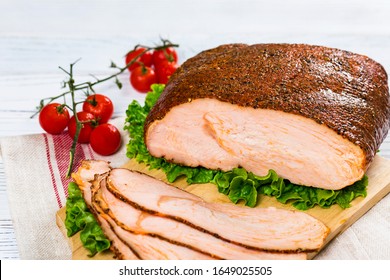 Cajun Style Roasted Turkey Breast Deli Sliced Lunch Meat On Wooden Background. Selective Focus.