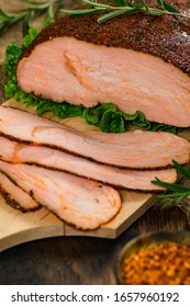 Cajun Style Roasted Turkey Breast Deli Sliced Lunch Meat On Wooden Background. Selective Focus.