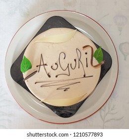 Cake with Auguri (meaning Happy Birthday in Italian) - Shutterstock ID 1210577893