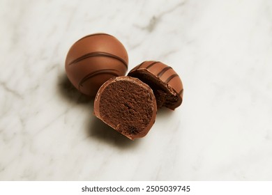 Cake balls are delightful bite-sized treats made from crumbled cake mixed with frosting, then rolled into balls and coated in chocolate or candy melts. They’re versatile, easy to make, and perfect for - Powered by Shutterstock