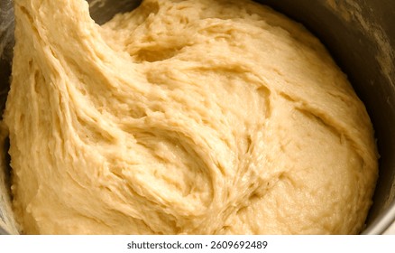 Cake or bread dough being processed.