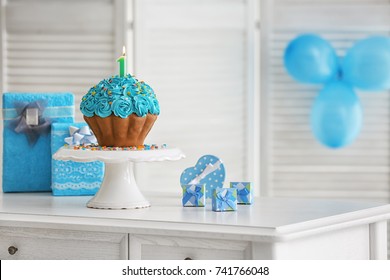 Cake With Candle For First Birthday On Table