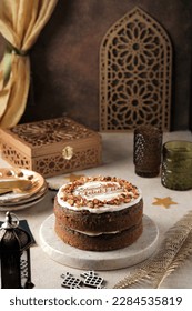 Cake for Eid Al Fitr celebration on white background. Eid mubarak ambience. Cake Hari Raya idul fitri - Shutterstock ID 2284535819