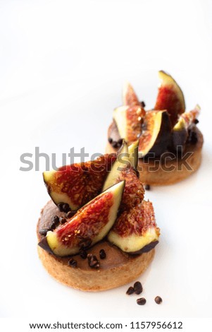 Similar – Image, Stock Photo Assorted gourmet pastries with fresh fruit toppings