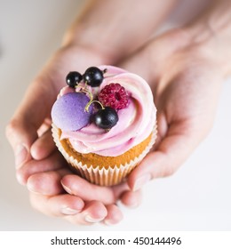 cake in hand