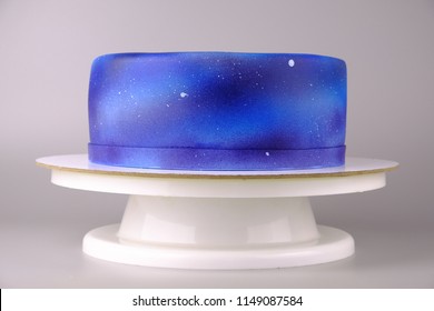 Cake With The Image Of The Cosmos Drawn By Airbrush. Galaxy, Stars In The Night Sky. Picture For A Menu Or A Confectionery Catalog.