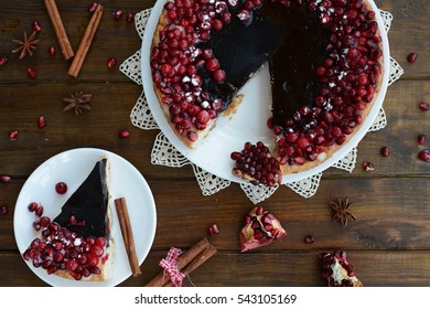 Cake With Jelly, Cranberry And Pomegranate On A Brown Wooden Table. Gala Dinner View From The Top