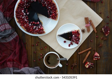 Cake With Jelly, Cranberry And Pomegranate On A Brown Wooden Table. Gala Dinner View From The Top