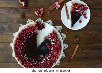 Cake With Jelly, Cranberry And Pomegranate On A Brown Wooden Table. Gala Dinner View From The Top